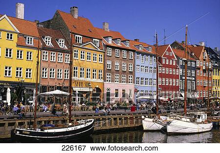 Buildings at waterfront, Nyhavn, Copenhagen, Hovedstaden, Denmark View Large Photo Image Stock Photo - Buildings at waterfront, Nyhavn, Copenhagen, Hovedstaden, Denmark . Fotosearch