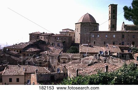 Buildings with cathedral in town, Cathedral Of Volterra, San Gimignano, Tuscany, Italy View Large Photo Image Stock Image - Buildings with cathedral in town, Cathedral Of Volterra, San Gimignano, Tuscany, Italy . Fotosearch
