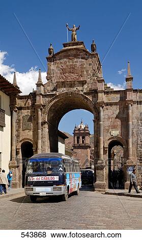 Bus crossing archway in city, Cuzco, Peru View Large Photo Image Stock Photo - Bus crossing archway in city, Cuzco, Peru . Fotosearch