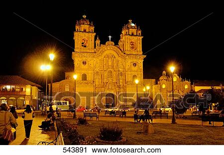 Stock Image - Church lit up at night, Iglesia La Compania De Jesus, Plaza-De-Armas, Cuzco, Cusco Region, Peru . Fotosearch
