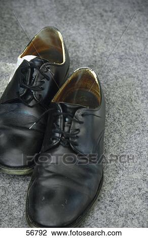 Stock Image - Close-up of pair of shoes . Fotosearch