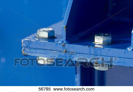 Close-up of screws bolted on metal sheet View Large Photo Image Stock Photography - Close-up of screws bolted on metal sheet . Fotosearch