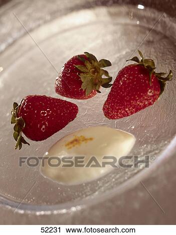 Close-up of strawberries with cream View Large Photo Image Stock Image - Close-up of strawberries with cream . Fotosearch