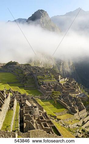 Clouds over old ruins on mountain, Inca Ruins, Machu Picchu, Cusco Region, Peru View Large Photo Image Stock Photograph - Clouds over old ruins on mountain, Inca Ruins, Machu Picchu, Cusco Region, Peru . Fotosearch
