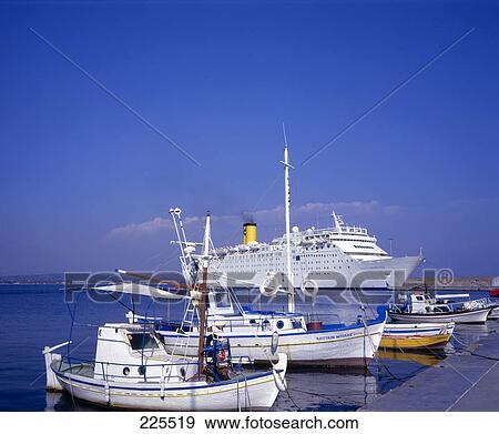 Cruise ship and boats at harbor, Katakolo, Pyrgos, Santorini, Greece View Large Photo Image Stock Photo - Cruise ship and boats at harbor, Katakolo, Pyrgos, Santorini, Greece . Fotosearch