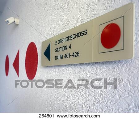 Stock Image - Directional sign in hospital . Fotosearch