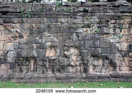 Elephants carved on stone wall, Cambodia View Large Photo Image Stock Photo - Elephants carved on stone wall, Cambodia . Fotosearch