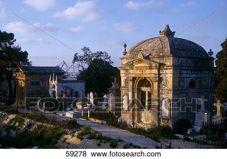 Facade of temple along cemetery, Malta, Europe View Large Photo Image Stock Photo - Facade of temple along cemetery, Malta, Europe . Fotosearch