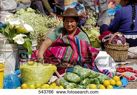 Female vendor in market place, Pisac, Urubamba Valley, Peru View Large Photo Image Stock Photograph - Female vendor in market place, Pisac, Urubamba Valley, Peru . Fotosearch