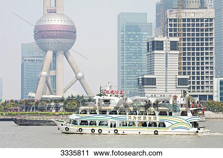 Ferry on a river, Skyscrapers in the background, Shanghai, China View Large Photo Image Stock Image - Ferry on a river, Skyscrapers in the background, Shanghai, China . Fotosearch