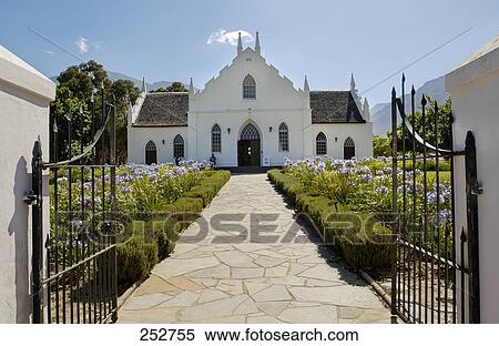 Stock Photography - Garden in front of church, Franshoek, Cape Winelands, Western Cape Province, South Africa . Fotosearch