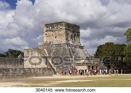 Group of tourists in front of the Temple of Jaguar at the Maya ruin site of Chichen Itza, Yucatan, Mexico View Large Photo Image Stock Photography - Group of tourists in front of the Temple of Jaguar at the Maya ruin site of Chichen Itza, Yucatan, Mexico . Fotosearch