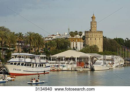 Guadalquivir and Torre del Oro, Sevilla, Andalucia, Spain View Large Photo Image Stock Image - Guadalquivir and Torre del Oro, Sevilla, Andalucia, Spain . Fotosearch
