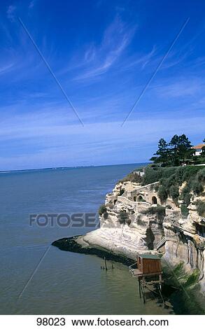 Stock Image - High angle view of a fishing hut on the coast, Talmont-sur-Gironde, Poitou-Charentes, France . Fotosearch