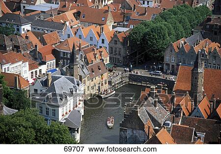 High angle view of city along river, Bruges, West Flanders, Germany View Large Photo Image Stock Photo - High angle view of city along river, Bruges, West Flanders, Germany . Fotosearch