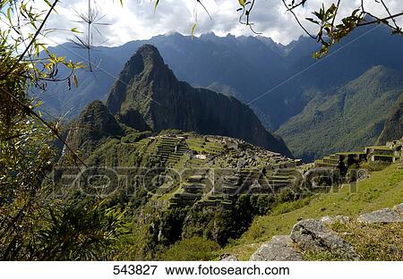 Stock Photo - High angle view of old ruins on mountain, Inca Ruins, Machu Picchu, Cusco Region, Peru . Fotosearch