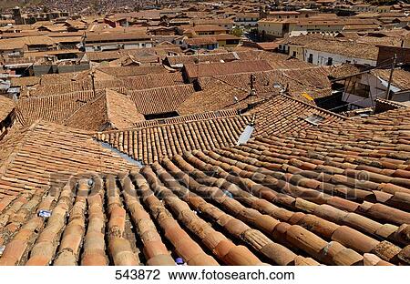 High angle view of tiled roofs of houses in town View Large Photo Image Stock Image - High angle view of tiled roofs of houses in town . Fotosearch