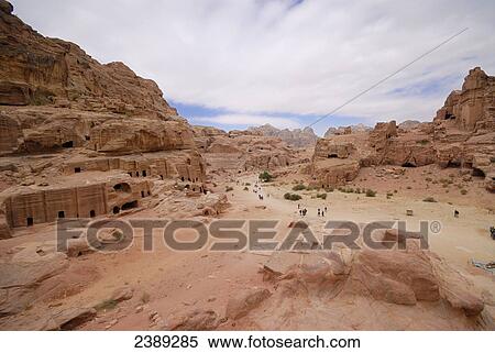 High angle view of tourists at archeological site, Petra, Wadi Musa, Jordan View Large Photo Image Stock Photography - High angle view of tourists at archeological site, Petra, Wadi Musa, Jordan . Fotosearch