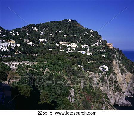 Houses on cliff at coast, Capri, Italy View Large Photo Image Stock Photography - Houses on cliff at coast, Capri, Italy . Fotosearch