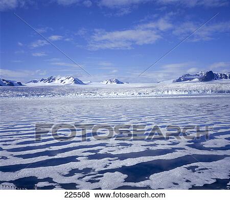 Ice floating on water, Spitsbergen, Svalbard Islands, Norway View Large Photo Image Stock Photo - Ice floating on water, Spitsbergen, Svalbard Islands, Norway . Fotosearch