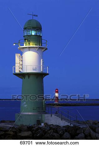 Stock Image - Lighthouse at dusk, Warnemuende, Rostock, Mecklenburg-Western Pomerania, Germany . Fotosearch