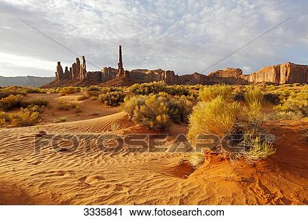 Monument Valley, Totem Pole Monument in the background, Utah, USA View Large Photo Image Stock Image - Monument Valley, Totem Pole Monument in the background, Utah, USA . Fotosearch
