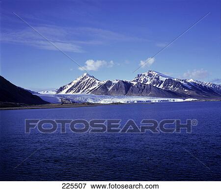 Mountain at seaside, Krossfjord, Spitsbergen, Svalbard Islands, Norway View Large Photo Image Stock Photo - Mountain at seaside, Krossfjord, Spitsbergen, Svalbard Islands, Norway . Fotosearch