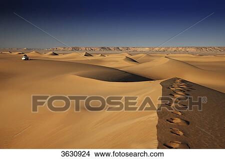Off-road vehicle in the Libyan Desert, Egypt View Large Photo Image Picture - Off-road vehicle in the Libyan Desert, Egypt . Fotosearch