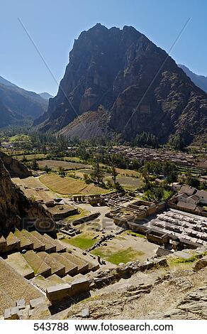 Stock Photo - Old ruins in valley, Inca Ruins, Machu Picchu, Cusco Region, Peru . Fotosearch