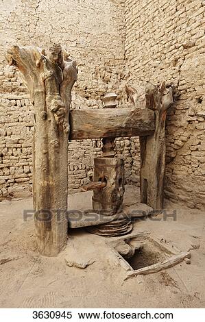 Olive squeezer in the old town Al-Qasr, Dakhla Oasis, Libyan Desert, Egypt View Large Photo Image Stock Photography - Olive squeezer in the old town Al-Qasr, Dakhla Oasis, Libyan Desert, Egypt . Fotosearch