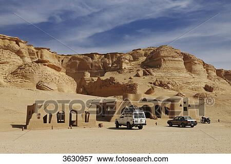 Parked cars at Wadi Hitan, Libyan Desert, Egypt View Large Photo Image Stock Photo - Parked cars at Wadi Hitan, Libyan Desert, Egypt . Fotosearch