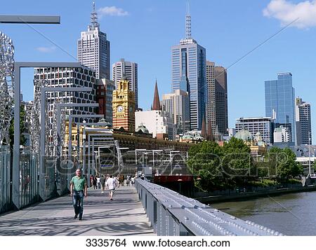 Pedestrians on a bridge in Melbourne, Australia View Large Photo Image Picture - Pedestrians on a bridge in Melbourne, Australia . Fotosearch