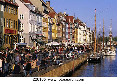 People at harbor, Nyhavn Canal, Copenhagen, Sjaelland, Denmark View Large Photo Image Stock Photography - People at harbor, Nyhavn Canal, Copenhagen, Sjaelland, Denmark . Fotosearch