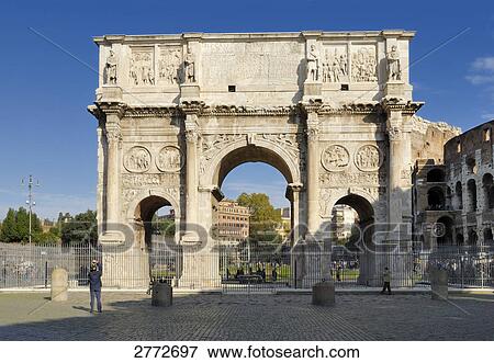 Stock Photo - People in front of triumphal arch, Arch of Constantine, Rome, Latium, Italy . Fotosearch
