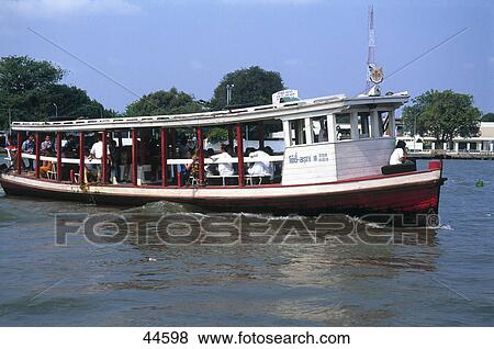 People in tour boat, Chao Phraya River, Bangkok, Thailand View Large Photo Image Stock Photo - People in tour boat, Chao Phraya River, Bangkok, Thailand . Fotosearch