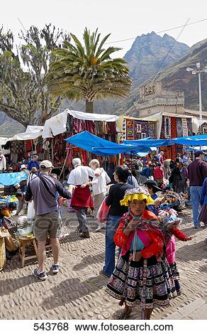 Stock Photo - People shopping in market, Pisac, Urubamba Valley, Peru . Fotosearch