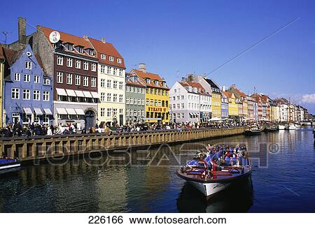 People sitting on boat in river, Nyhavn, Copenhagen, Sjaelland, Denmark View Large Photo Image Stock Photograph - People sitting on boat in river, Nyhavn, Copenhagen, Sjaelland, Denmark . Fotosearch