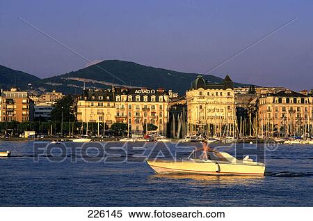 Person on a speed boat in a lake water, Geneva, Switzerland View Large Photo Image Stock Photography - Person on a speed boat in a lake water, Geneva, Switzerland . Fotosearch