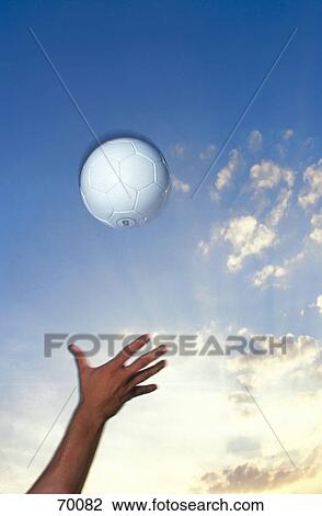 Person's hand reaching out for volley ball View Large Photo Image Stock Image - Person's hand reaching out for volley ball . Fotosearch