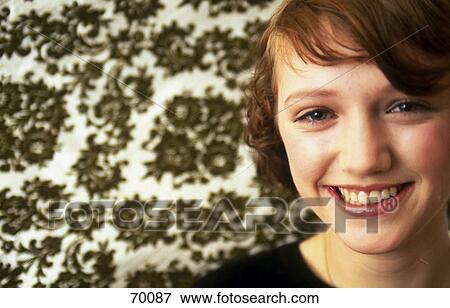 Portrait of teenage girl smiling View Large Photo Image Stock Photo - Portrait of teenage girl smiling . Fotosearch