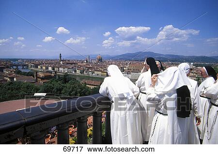 Rear view of nuns at Piazza Michaelangelo, Florence, Italy View Large Photo Image Stock Photo - Rear view of nuns at Piazza Michaelangelo, Florence, Italy . Fotosearch