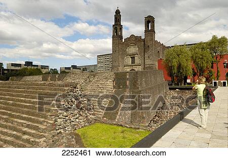 Rear view of woman standing in front of church View Large Photo Image Stock Image - Rear view of woman standing in front of church . Fotosearch