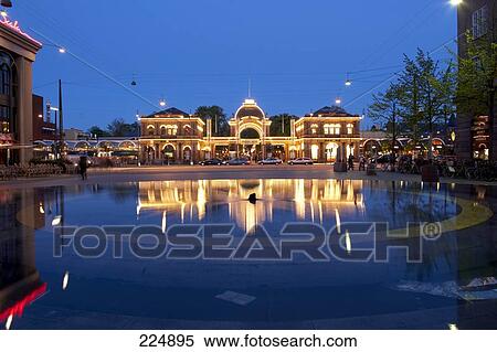 Reflection of building in water, Tivoli Gardens, Copenhagen, Denmark View Large Photo Image Stock Photography - Reflection of building in water, Tivoli Gardens, Copenhagen, Denmark . Fotosearch