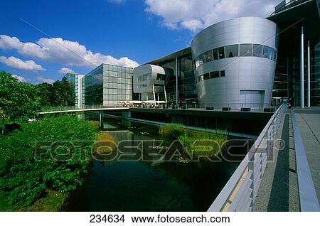 Reflection of glass factory at waterfront, Dresden, Lower Saxony, Germany View Large Photo Image Picture - Reflection of glass factory at waterfront, Dresden, Lower Saxony, Germany . Fotosearch