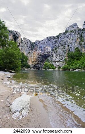 River flowing through canyon, Gorges Of Ardeche, Provence-Alpes-Cote d'Azur, France View Large Photo Image Stock Photo - River flowing through canyon, Gorges Of Ardeche, Provence-Alpes-Cote d'Azur, France . Fotosearch