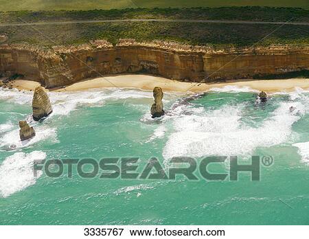 Stock Photo - Rock formation at a coast, Port Campbell National Park, Australia, bird's eye view . Fotosearch