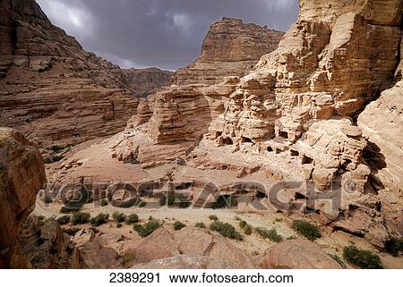 Rock formations on landscape, Petra, Wadi Musa, Jordan View Large Photo Image Stock Image - Rock formations on landscape, Petra, Wadi Musa, Jordan . Fotosearch