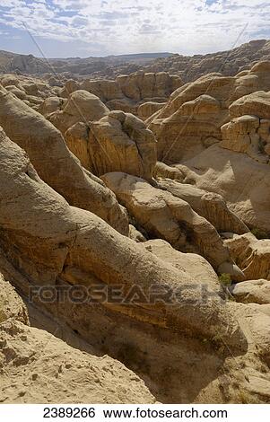 Rock formations on landscape, Petra, Wadi Musa, Jordan View Large Photo Image Stock Photograph - Rock formations on landscape, Petra, Wadi Musa, Jordan . Fotosearch
