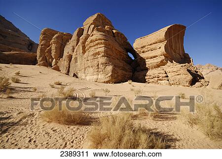 Rock formations on landscape, Wadi Rum, Jordan View Large Photo Image Stock Image - Rock formations on landscape, Wadi Rum, Jordan . Fotosearch