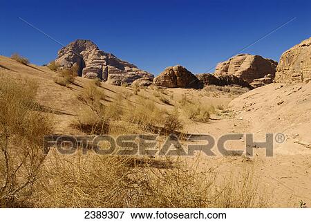 Rock formations on landscape, Wadi Rum, Jordan View Large Photo Image Stock Photo - Rock formations on landscape, Wadi Rum, Jordan . Fotosearch